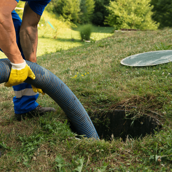 Emptying household septic tank. Cleaning sludge from septic system.