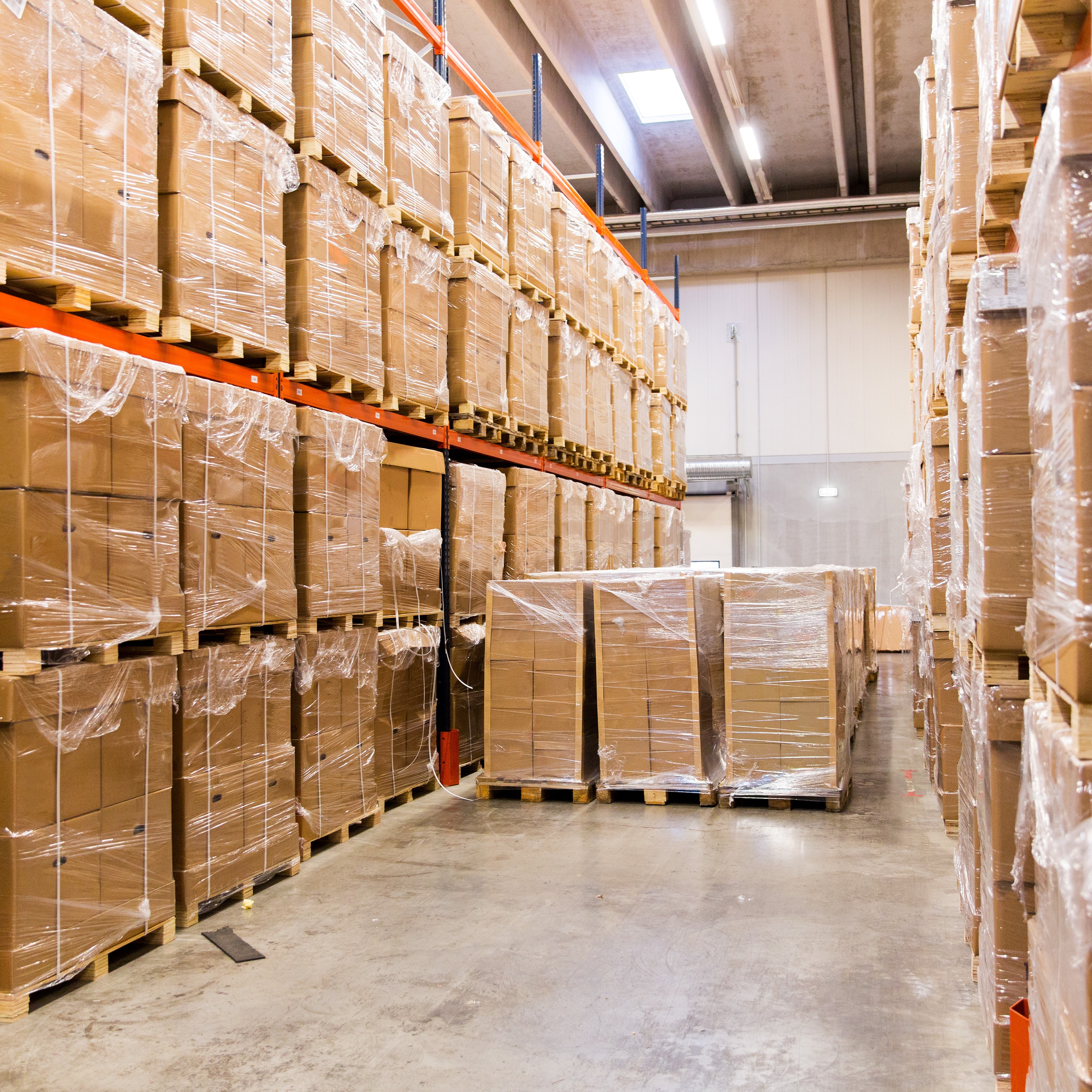cargo boxes storing at warehouse shelves