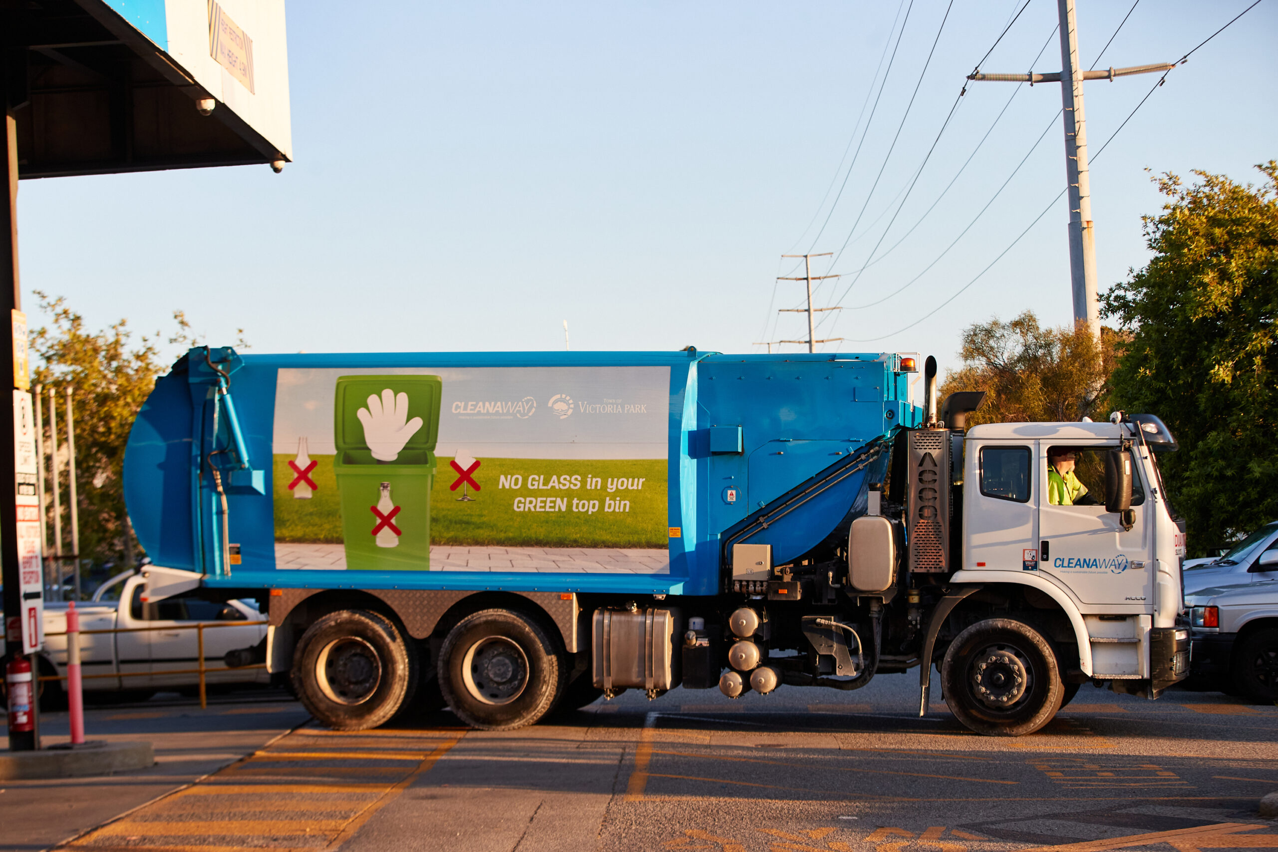 Cleanaway driver in truck, Victoria Park truck, truck art