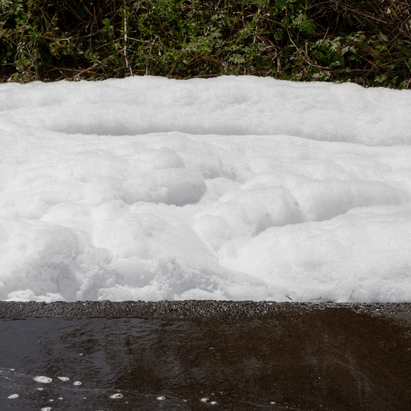 Environmental Hazard: Toxic PFOS Chemical Fire Foam Floating Down Street, Firefighting Chemicals