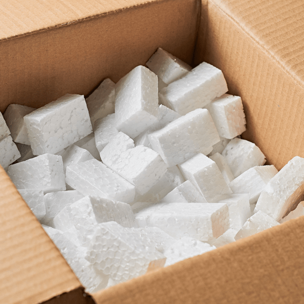 Open square cardboard box for parcels full of rectangular styrofoam blocks