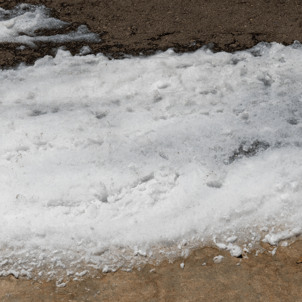 Environmental Hazard: Toxic PFOS Firefighting Foam Spill on Urban Street