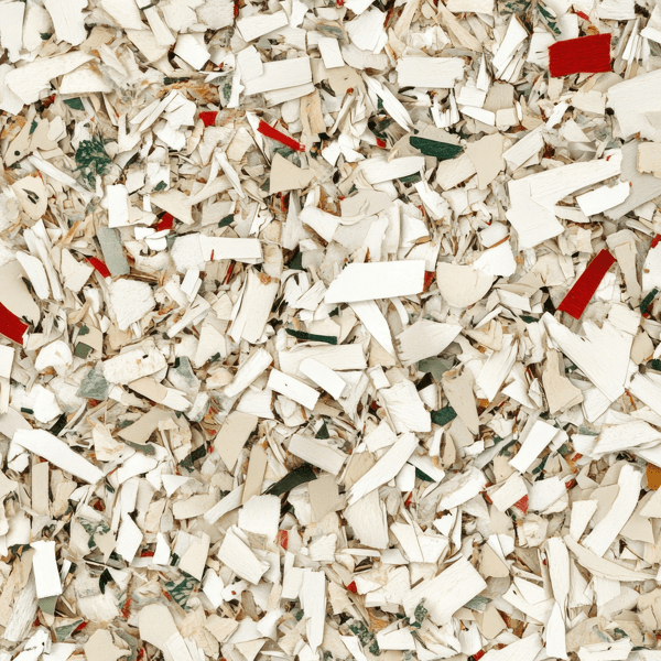 High angle view of shredded paper pieces, creating a textured abstract background suitable for