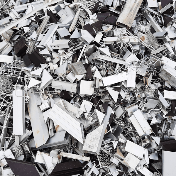 Pile of aluminium frames residue in a furniture workshop for recycling