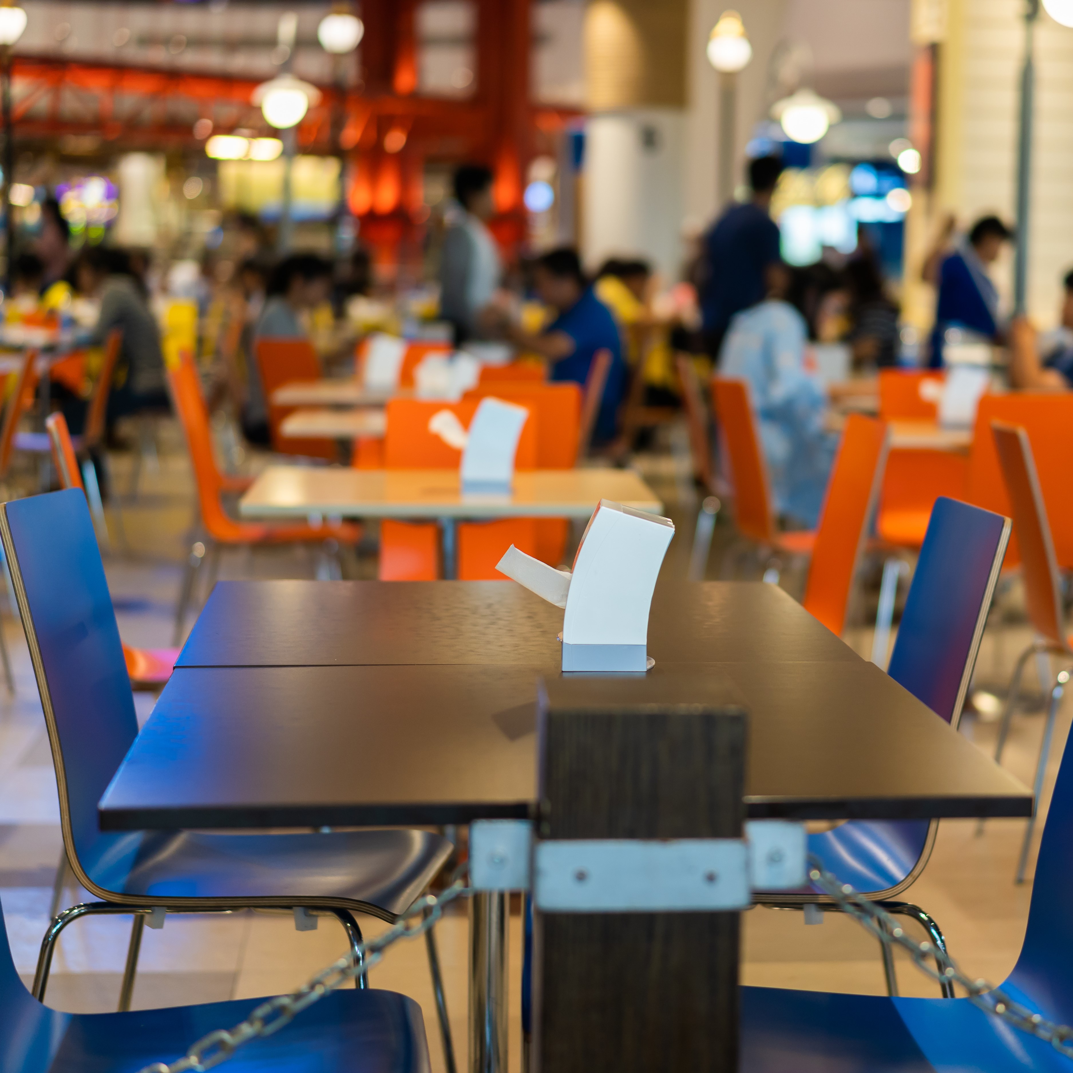 Tables and chairs on food court