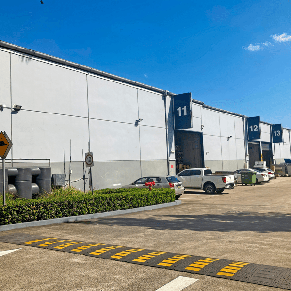 Sydney, NSW Australia - September 2 2023: A driveway to a number of business industrial units in a business park